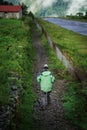 Man Walking on The Side of TenzingÃ¢â¬âHillary Airport Runway, Lukla Nepal